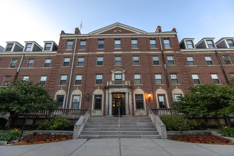 A view looking up at the brick exterior of Ball Hall.